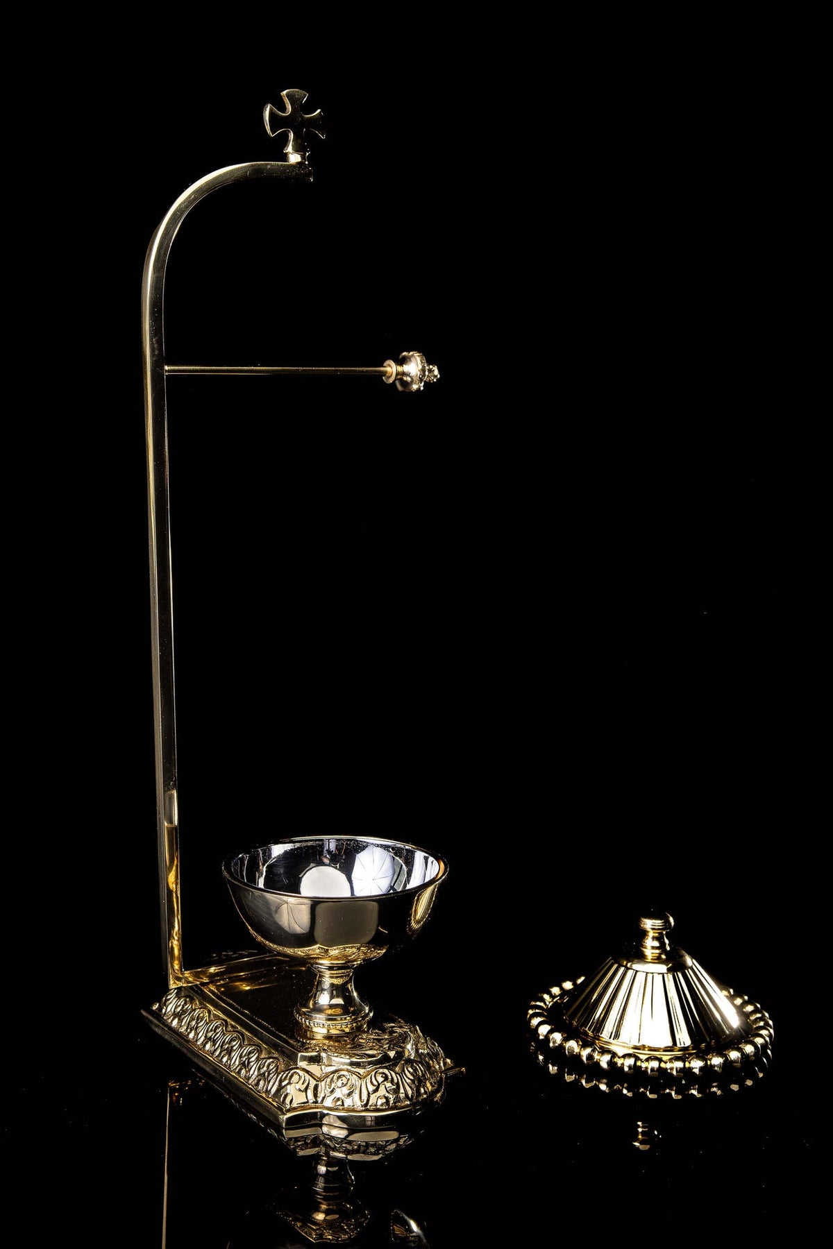 Purificator holder with cross and removable covered bowl shown beside the base