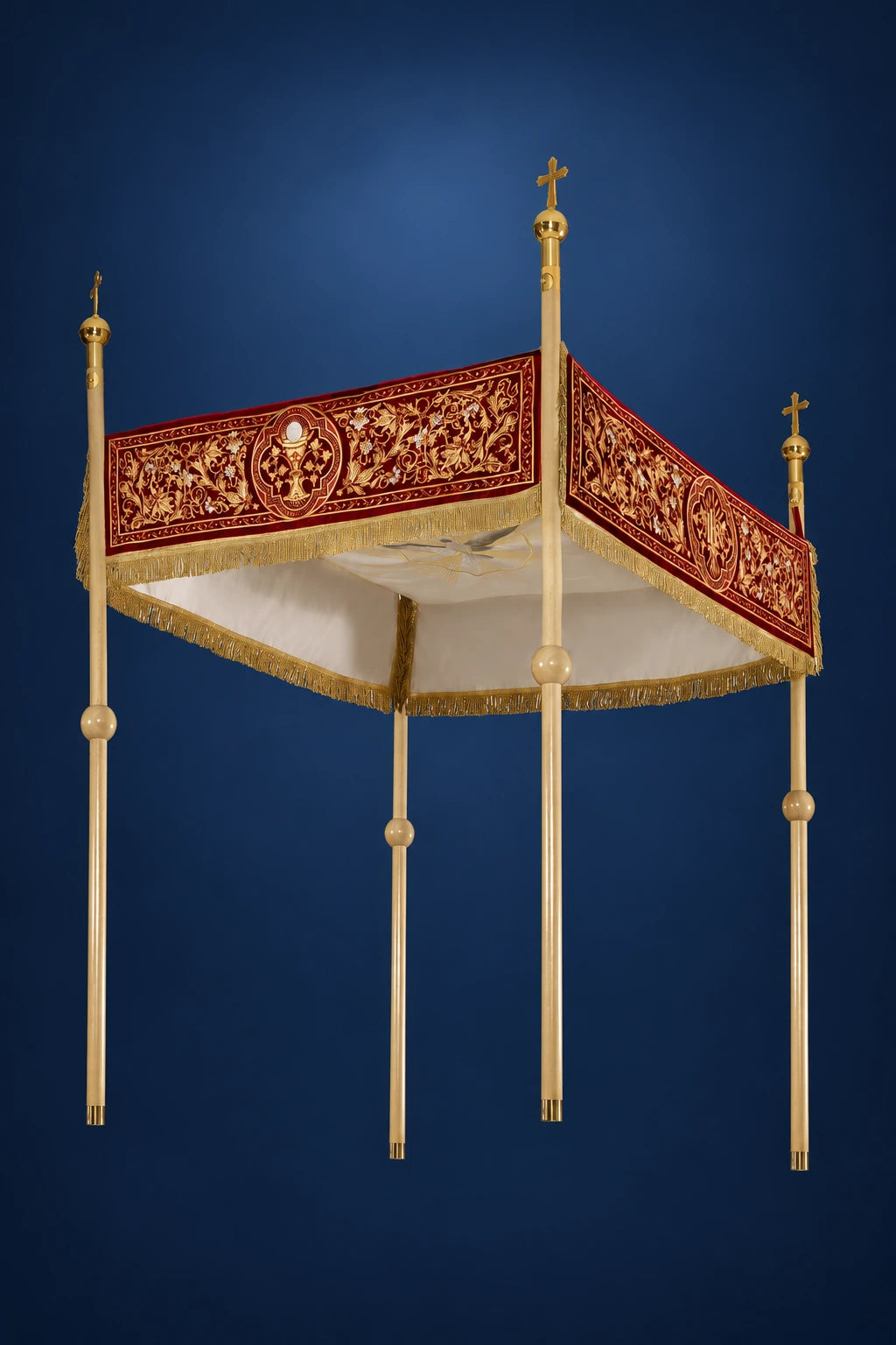 Burgundy church canopy with gold Sacred Heart and Chi Rho trim, shown in three-quarter view with hanging poles