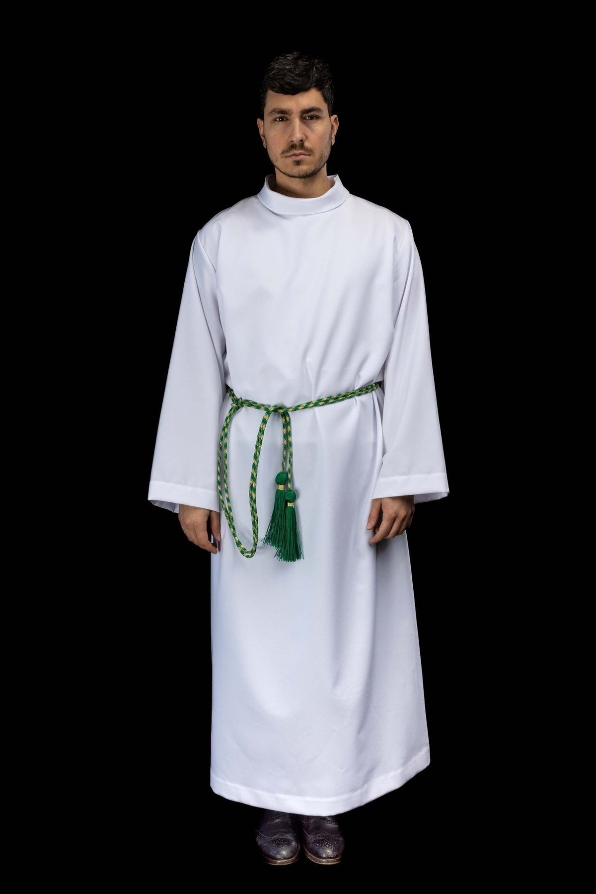 Green and gold cincture shown worn over a white alb