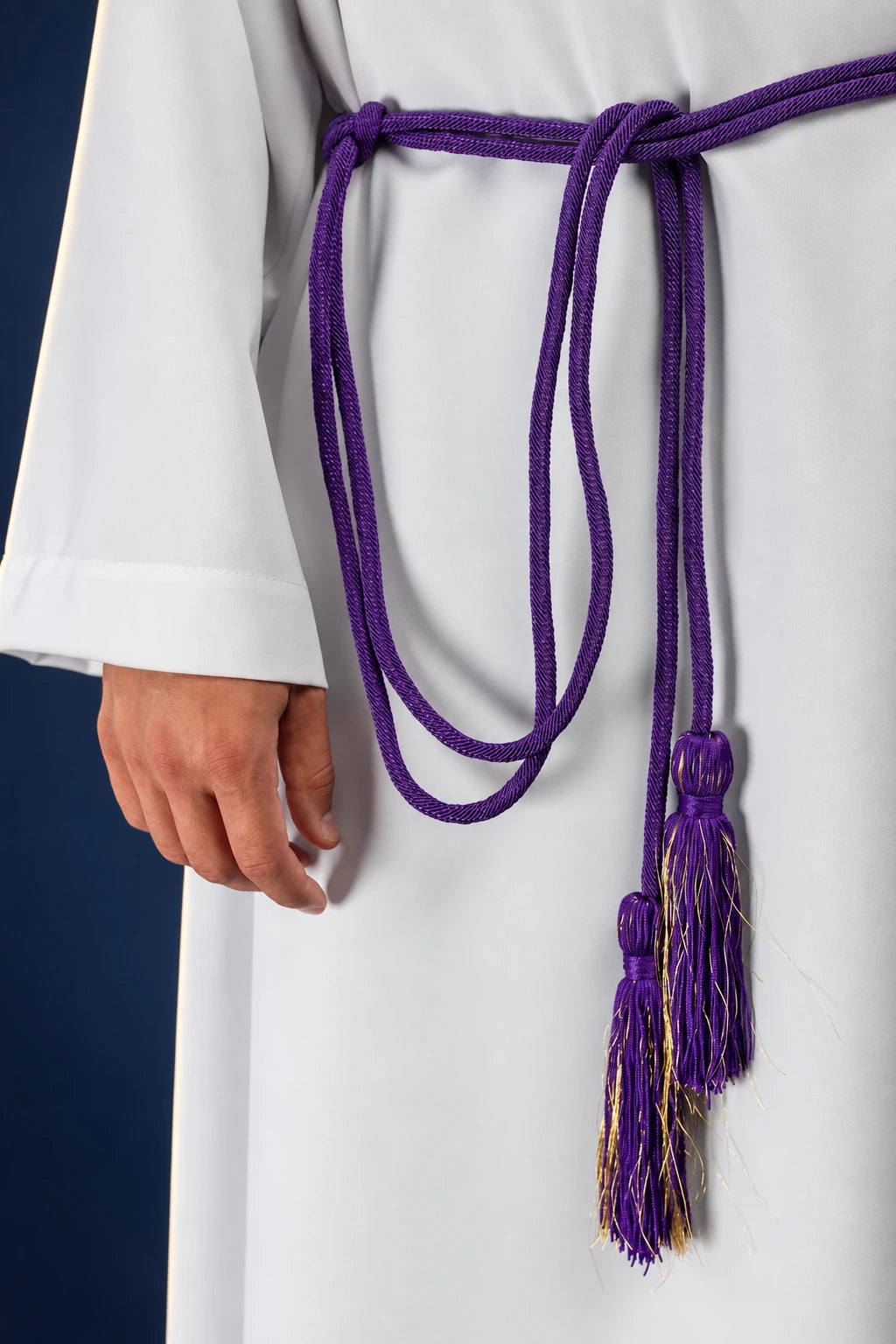 Premium Purple Liturgical Cincture with Decorative Tassel Ends, front view worn with purple braided cord and tassels