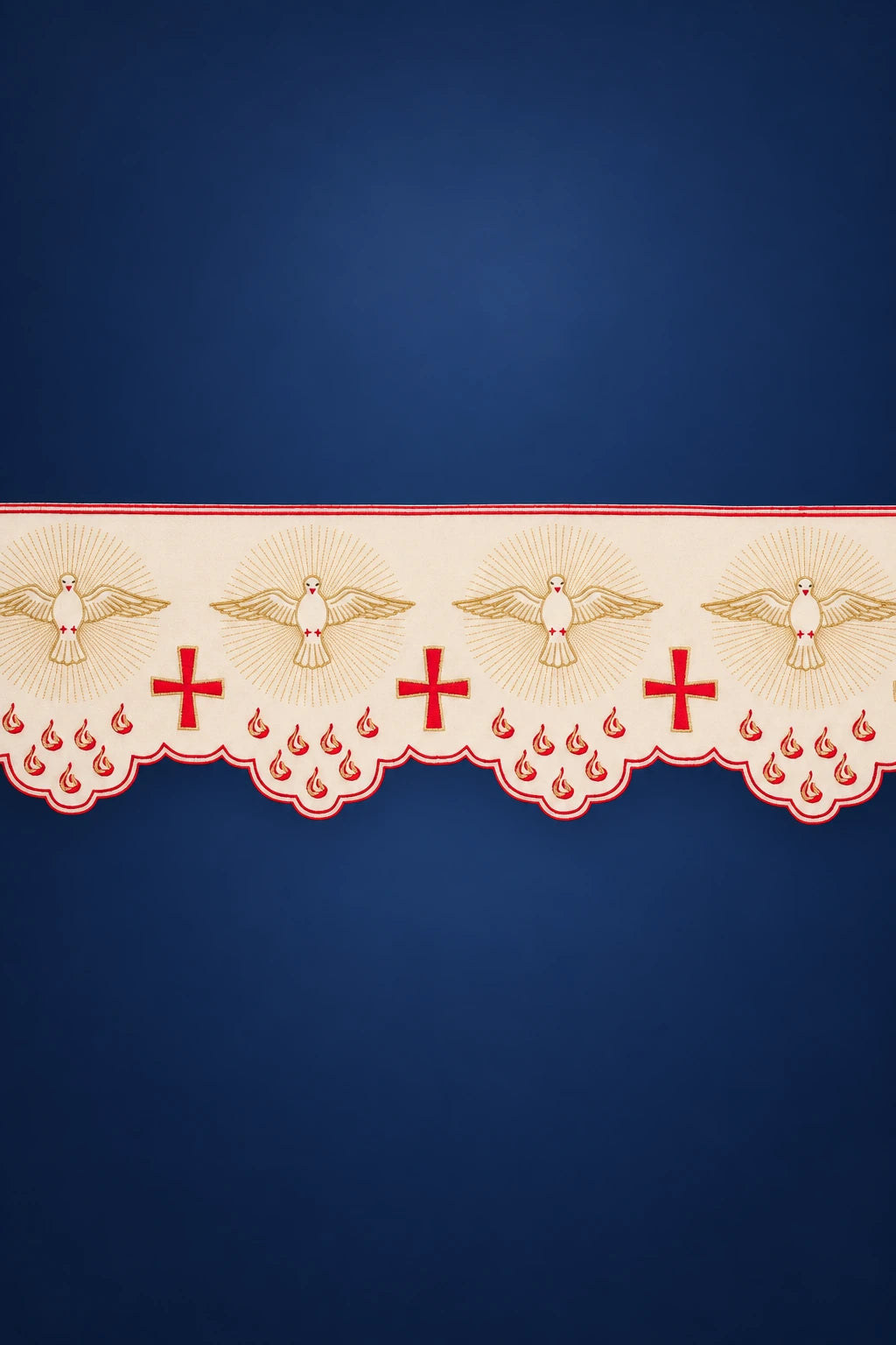 Close-up of ecru altar lace with scalloped white dove-and-cross border embroidery