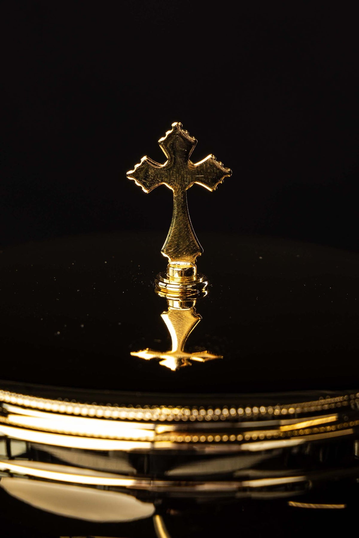 Ciborium cross finial and lid in close-up