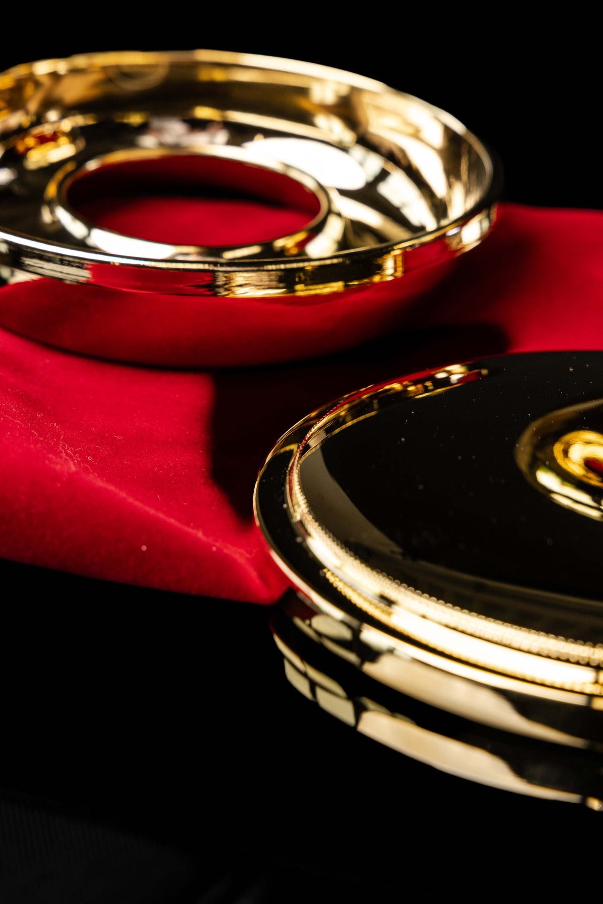 Ciborium bowl and cross-topped lid in close-up