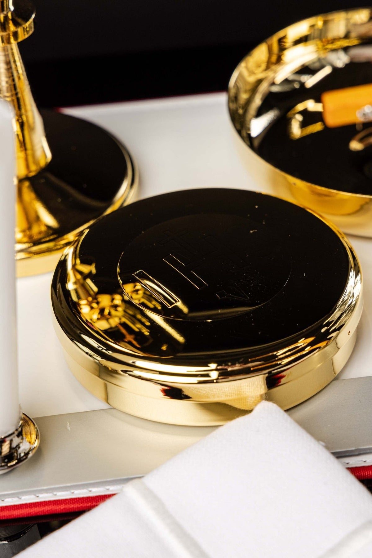 Mission case gold paten with raised cross detail
