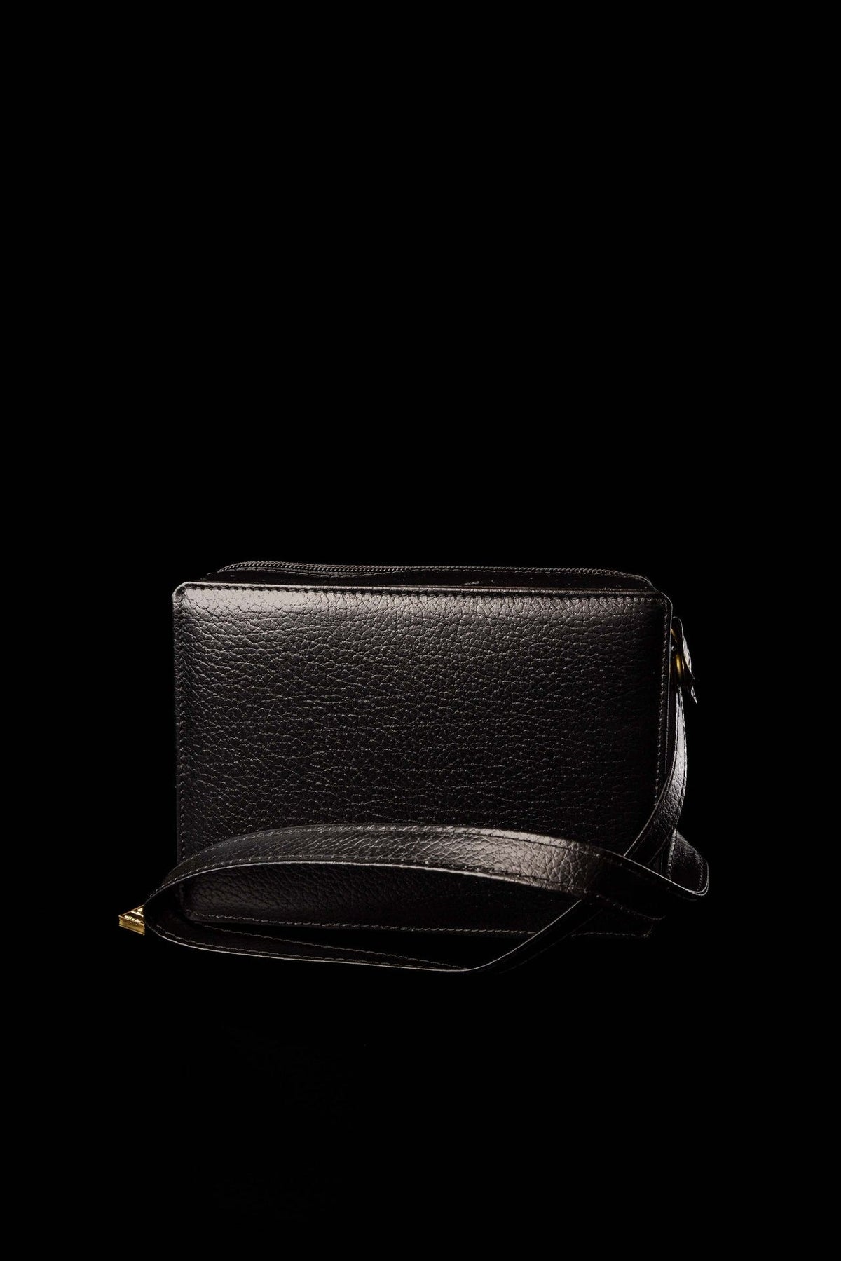 Mission Suitcase with Liturgical Equipment and Shoulder Strap, black front view with shoulder strap