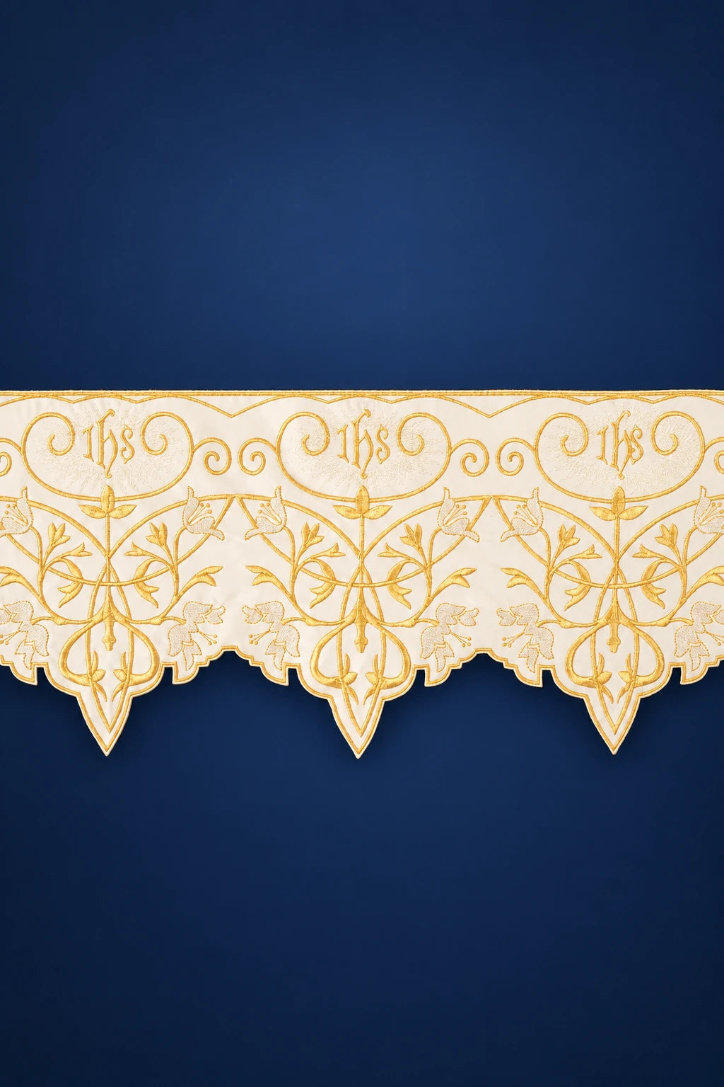 Ecru altar lace trim with repeated IHS monogram and scalloped pointed edge