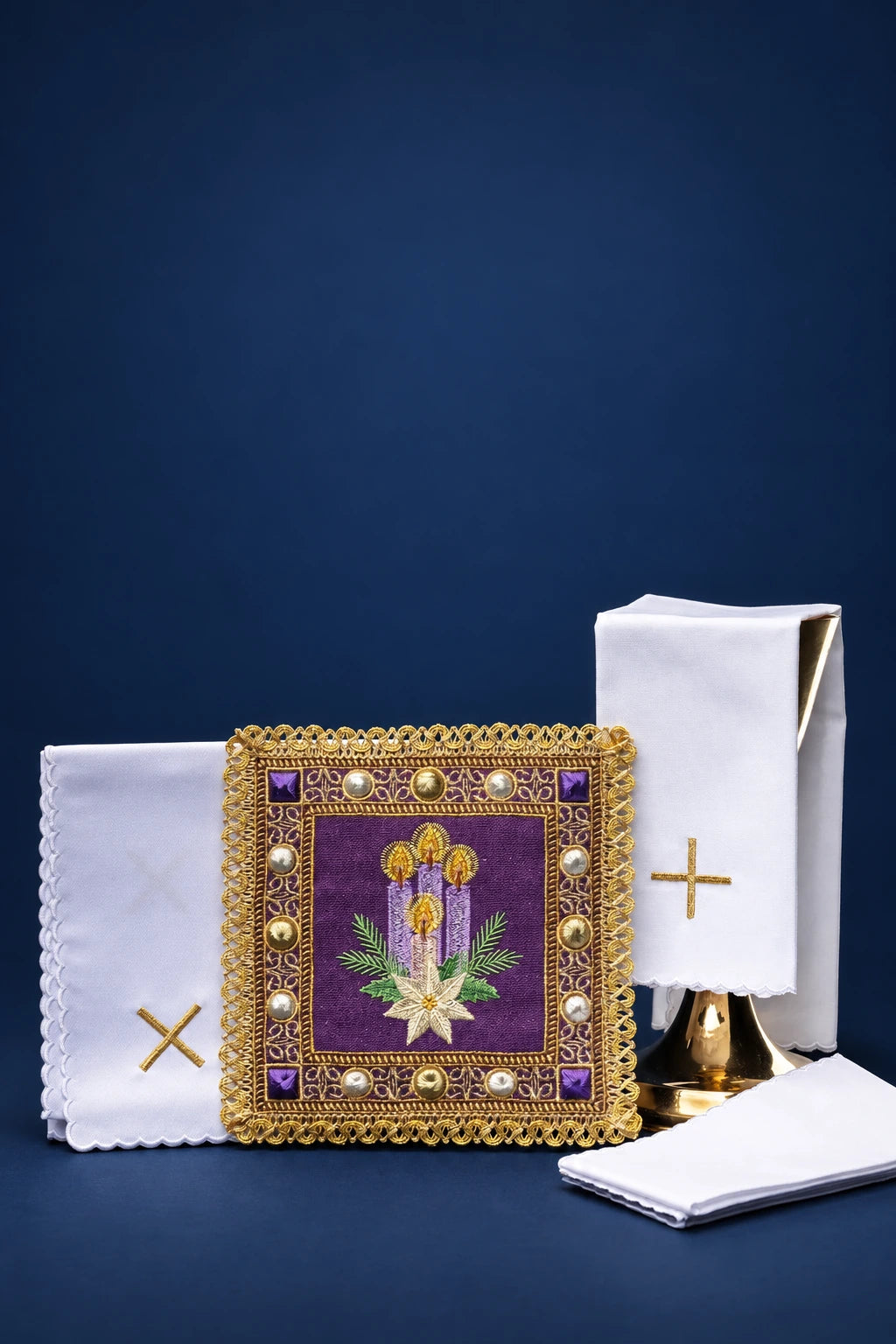 Embroidered Advent altar linen set with a purple central panel, gold trim, and gold cross embroidery on folded linens