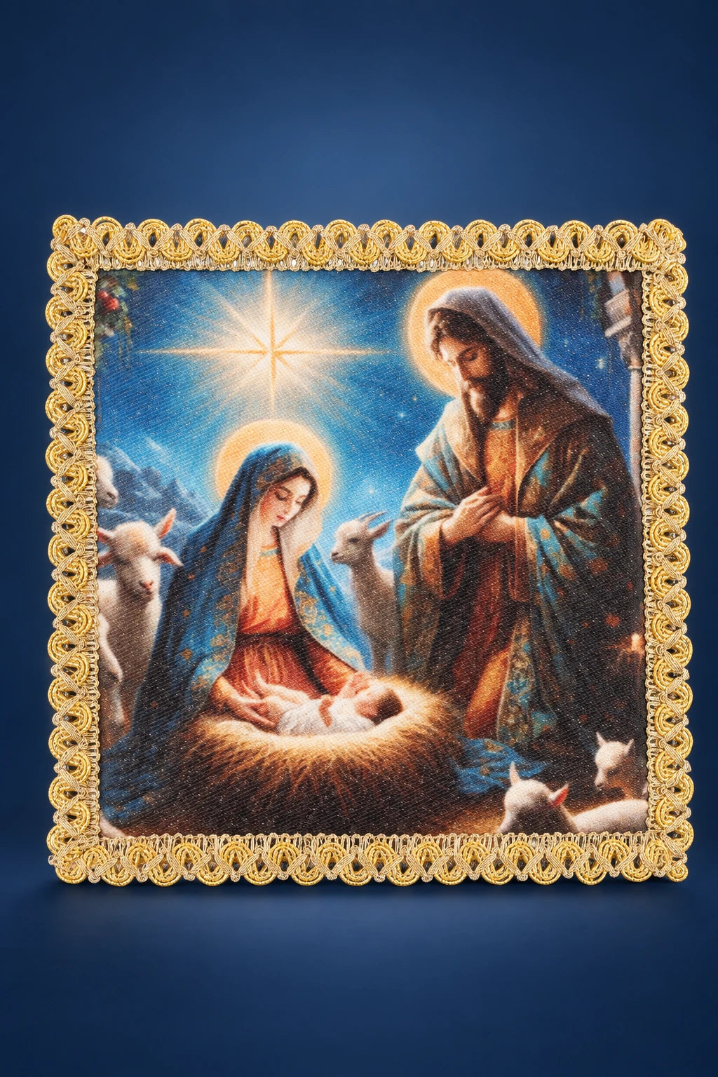 Front view of a chalice pall with Holy Family nativity image and gold lace border