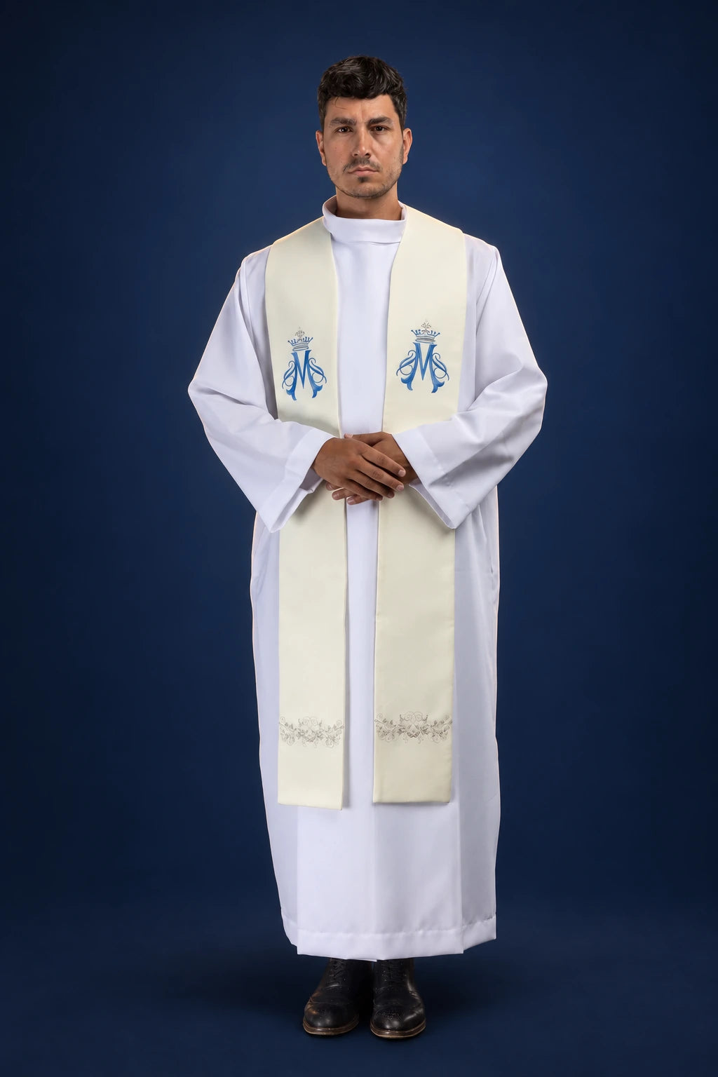 Front view of an ecru Catholic stole with blue Marian emblems and small crown embroidery near the hem