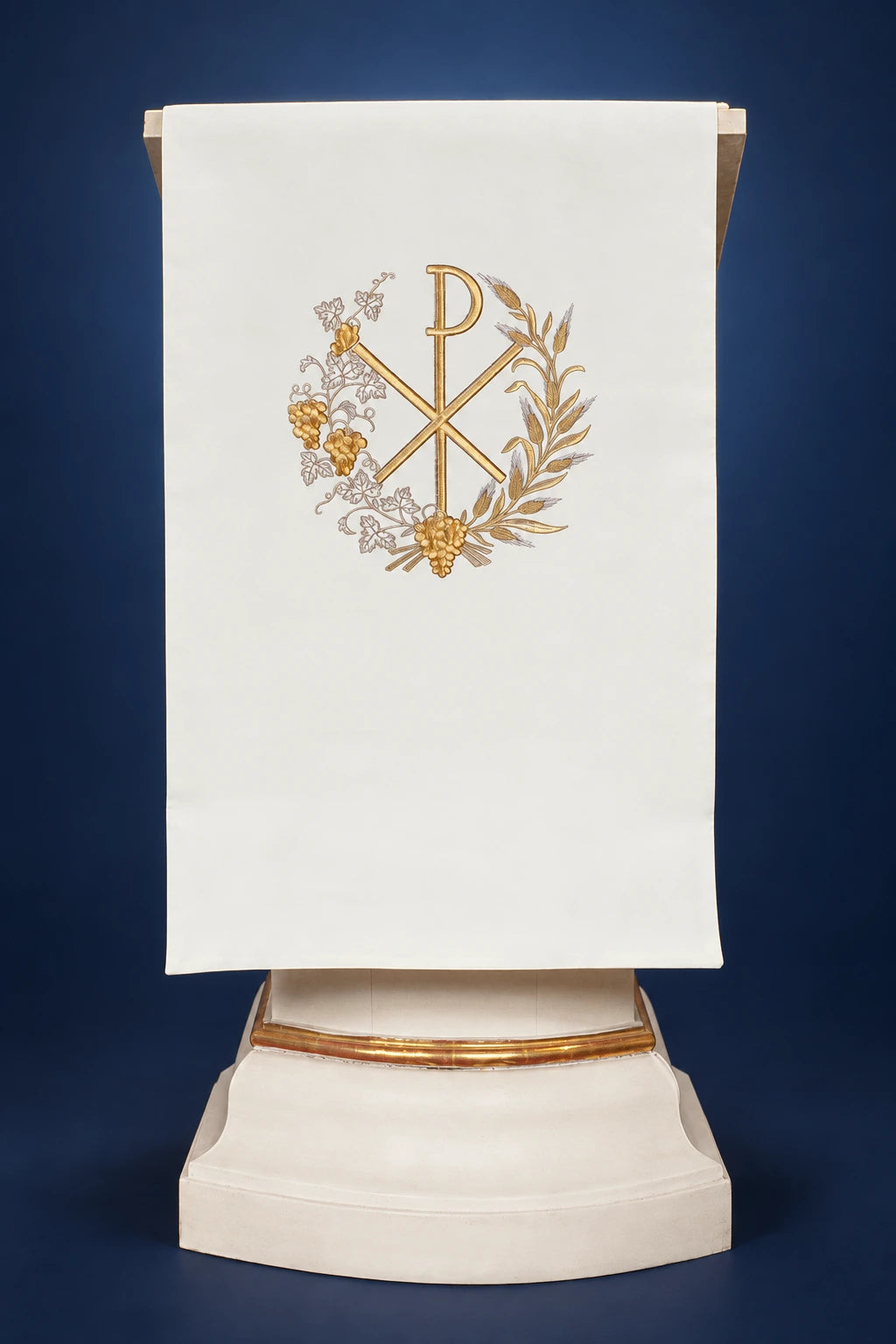 Front view of an ecru lectern cover with gold PAX embroidery and wheat wreath motif