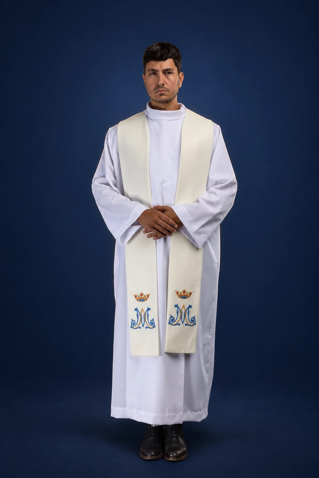 Front view of an ecru Marian stole with embroidered crown and floral monogram motifs at the ends