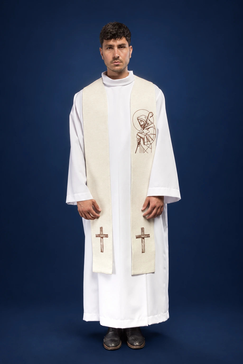 Front view of an ecru stole with embroidered Good Shepherd motif and cross ends, worn over a white alb