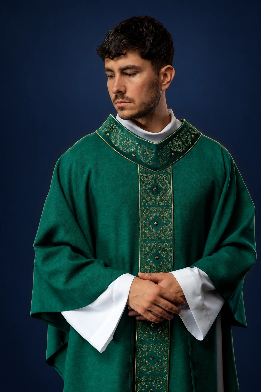 Front view of green chasuble with embroidered orphrey and matching collar detail