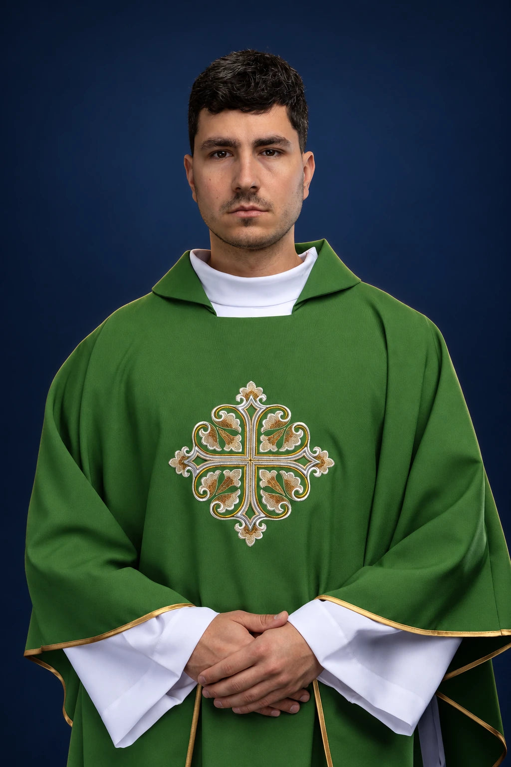 Front view of green chasuble with wide collar and embroidered cross on chest