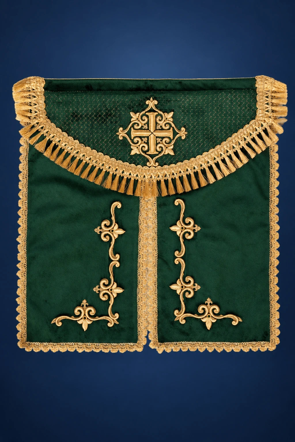 Front view of a green velvet tabernacle veil with gold fringe and embroidered cross motifs