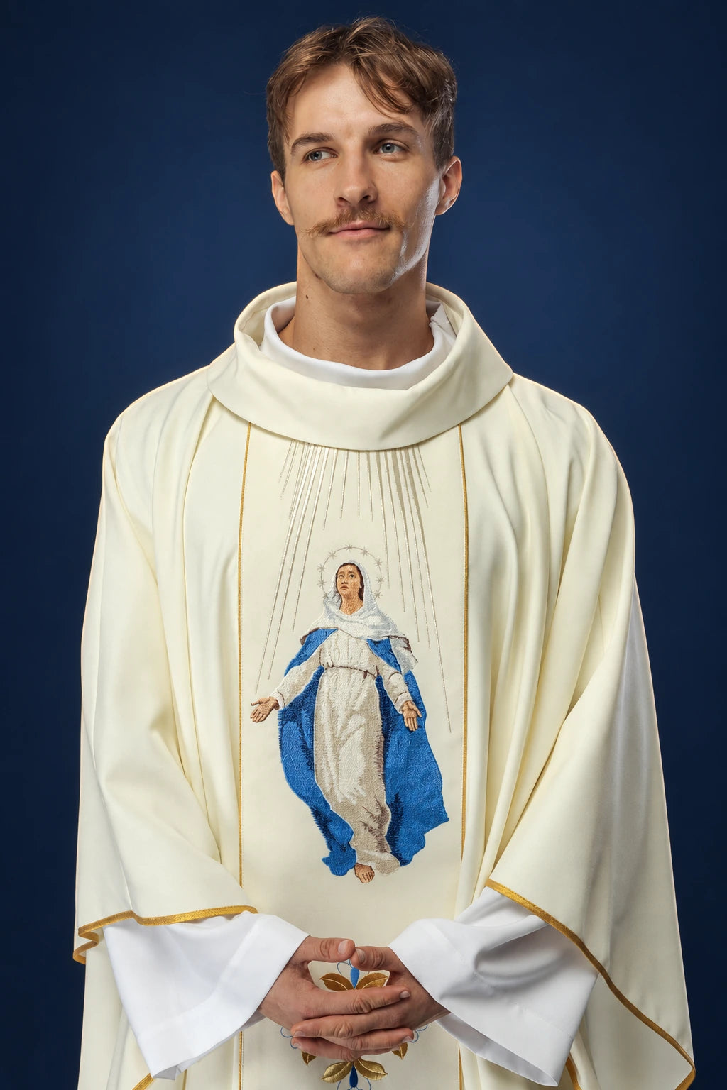 Front view of ivory chasuble with embroidered Our Lady of the Assumption on the front panel