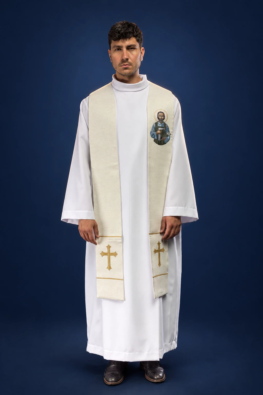 Front view of an ivory stole with Saint Joseph the Worker medallion and gold crosses at the ends