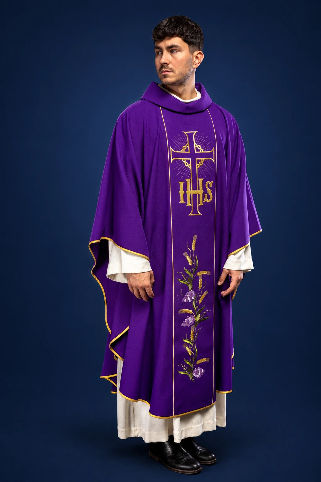 Front view of a purple chasuble with gold orphrey, IHS cross, and wheat embroidery