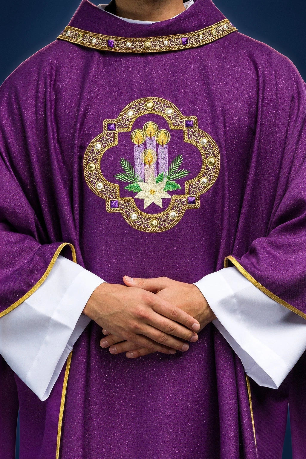Front view of a purple chasuble with gold-trimmed embroidered Advent candle emblem on the chest