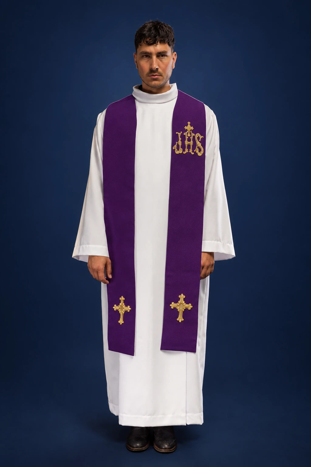 Front view of a purple priest stole with gold IHS and cross embroidery over a white alb