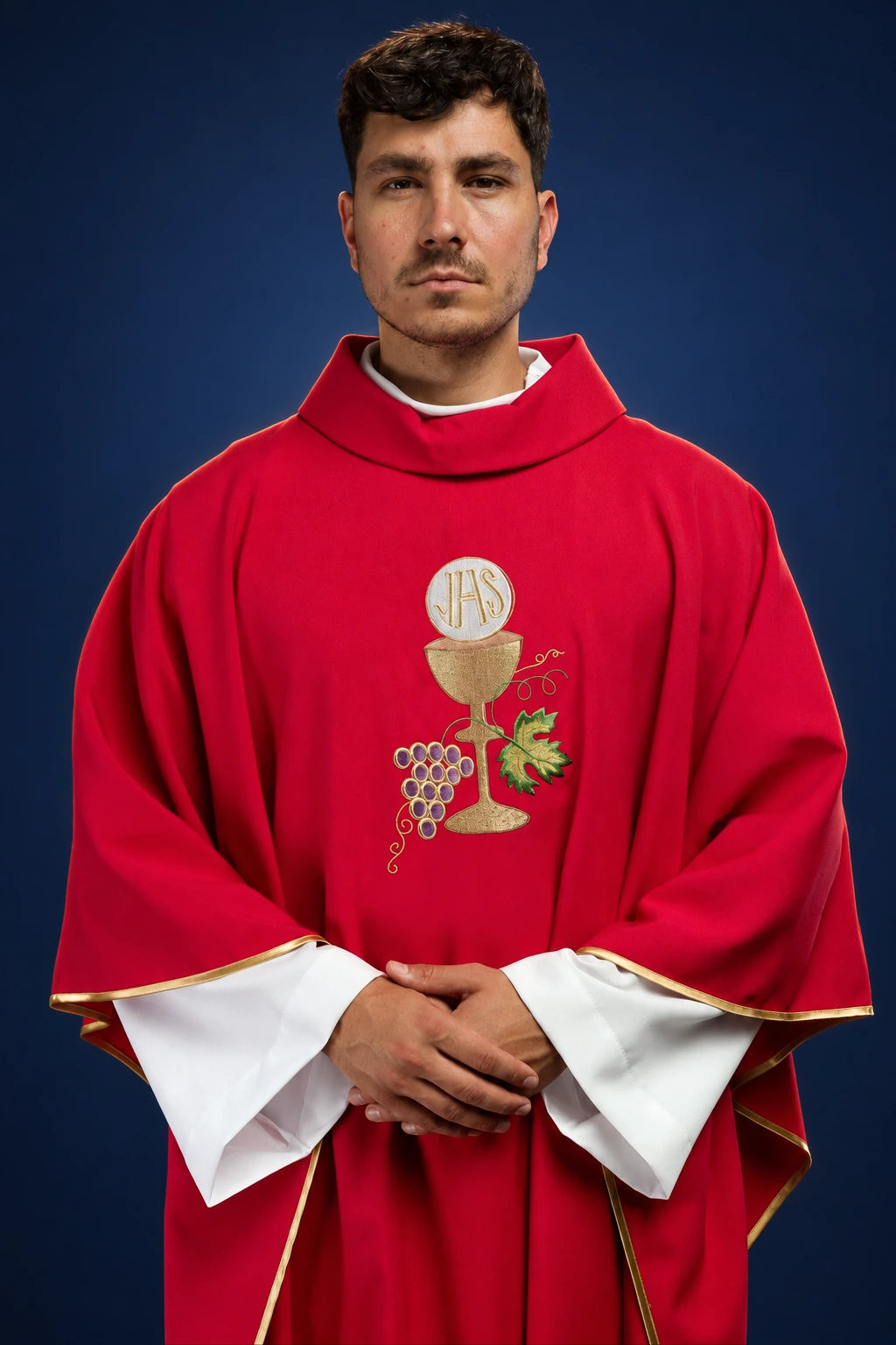 Front view of a red chasuble with chalice, cross and grapes embroidery