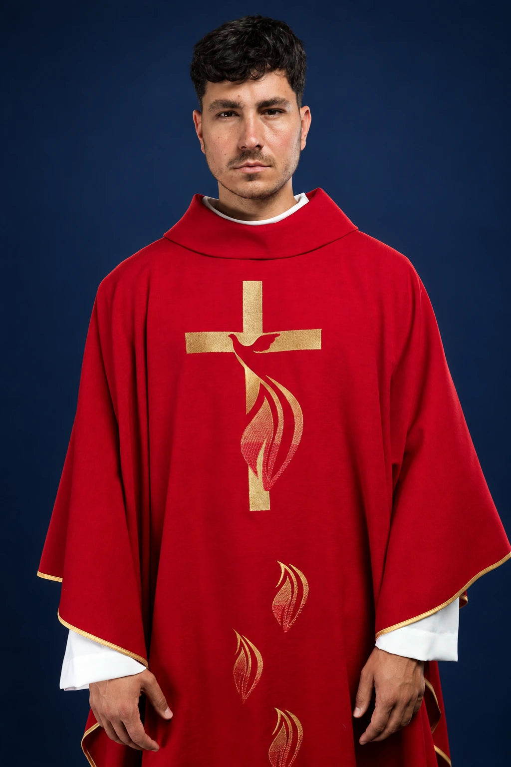 Front view of a red chasuble with gold trim and Holy Spirit cross-and-dove embroidery