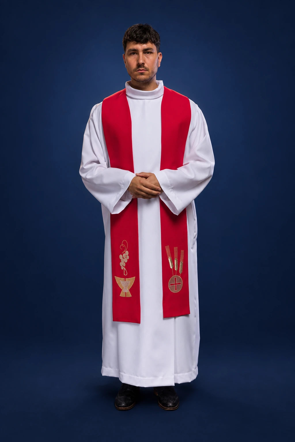 Front view of a red embroidered priest stole with chalice, wheat, and grapes over a white alb