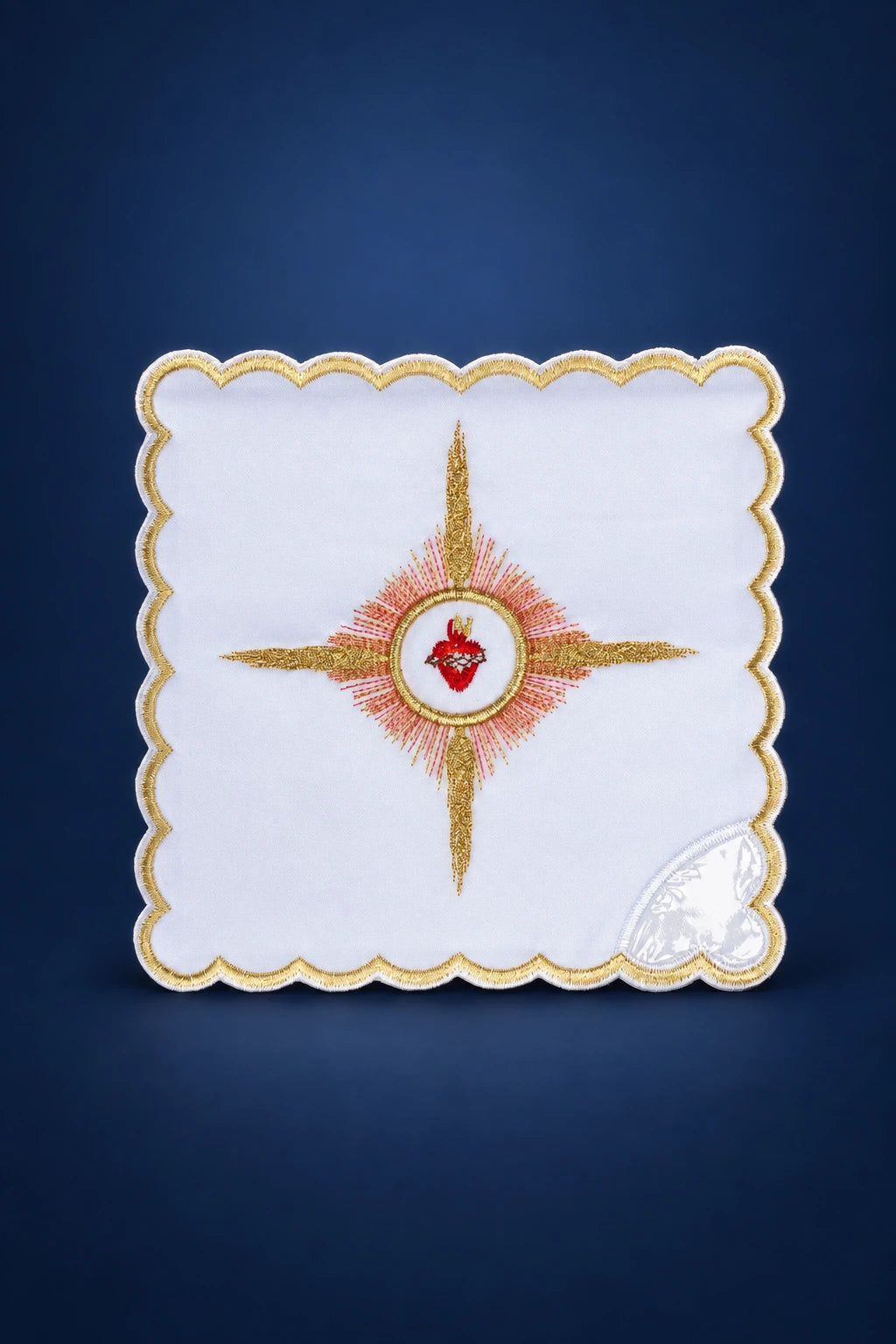 Front view of a square white chalice pall with scalloped gold trim and embroidered Sacred Heart cross motif