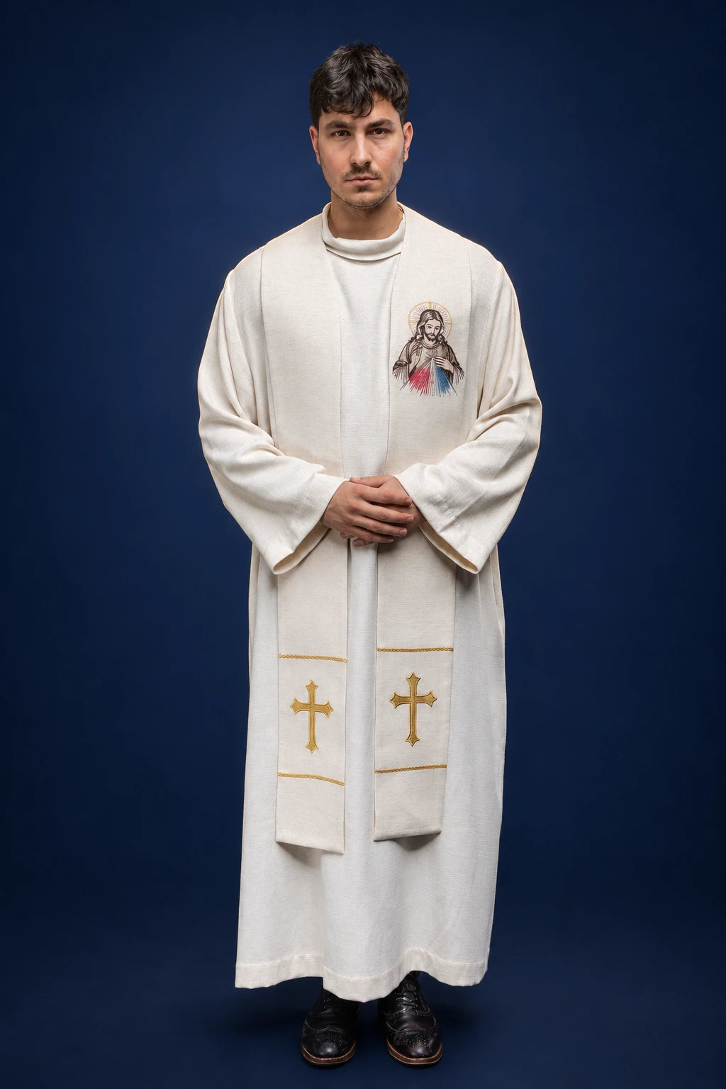 Front view of a white embroidered stole with Divine Mercy image and gold crosses