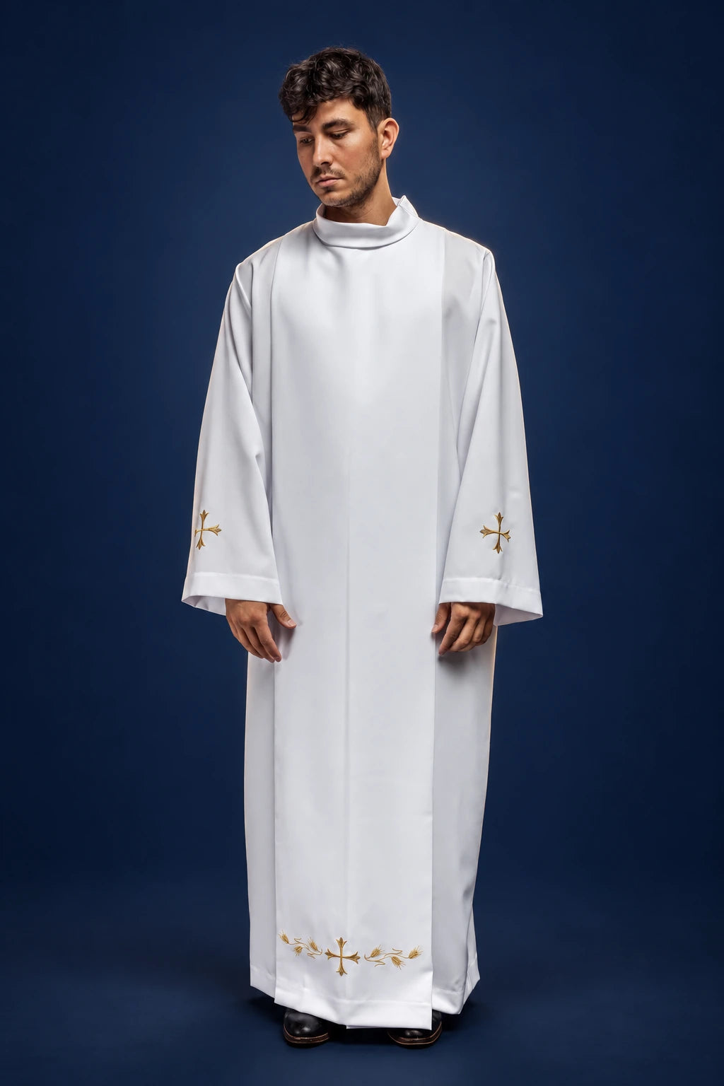 Front view of a white priest alb with stand-up collar and gold cross embroidery at the cuffs and hem