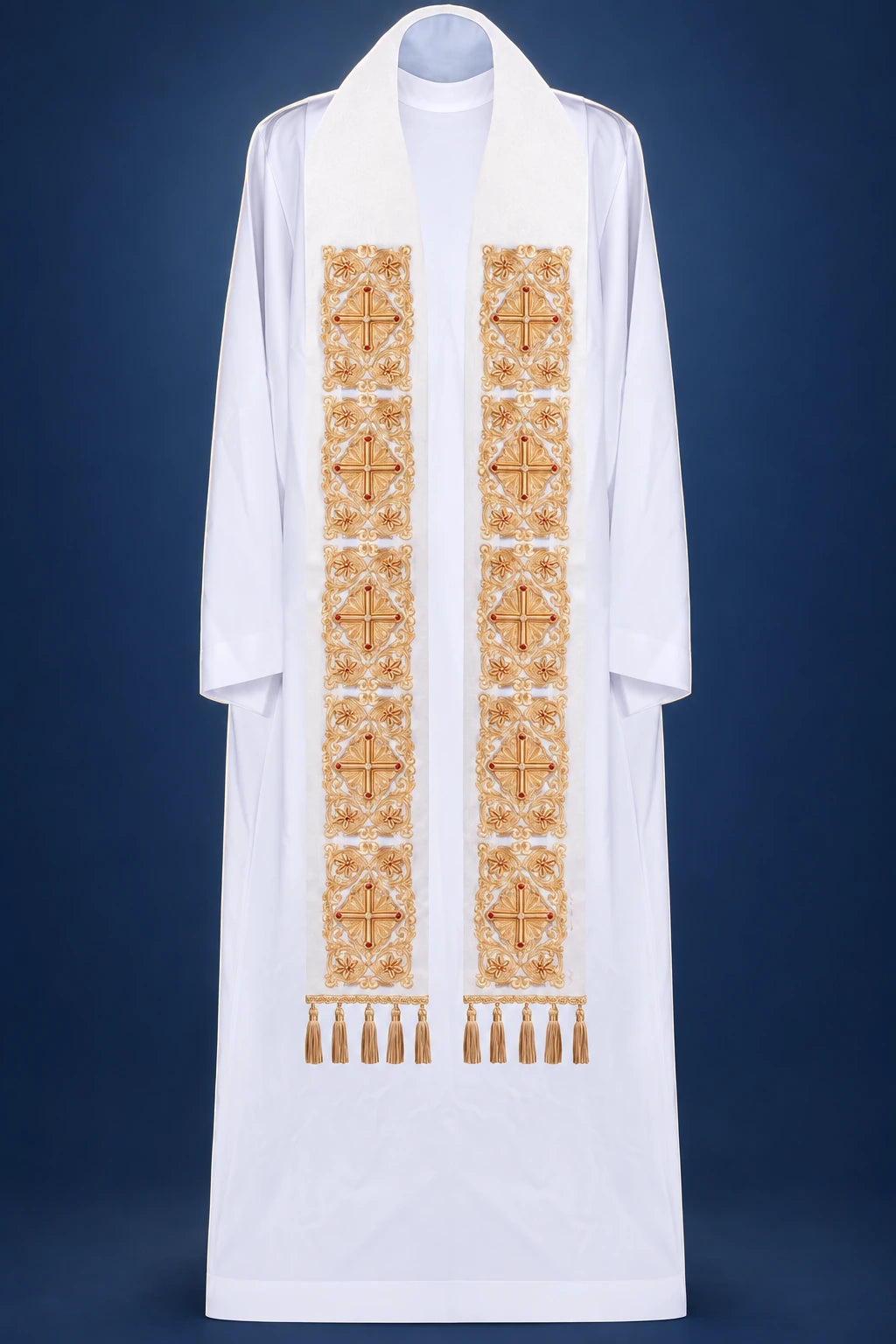 Front view of a white priest stole with gold embroidered panels and faceted stone accents, ending in tassels