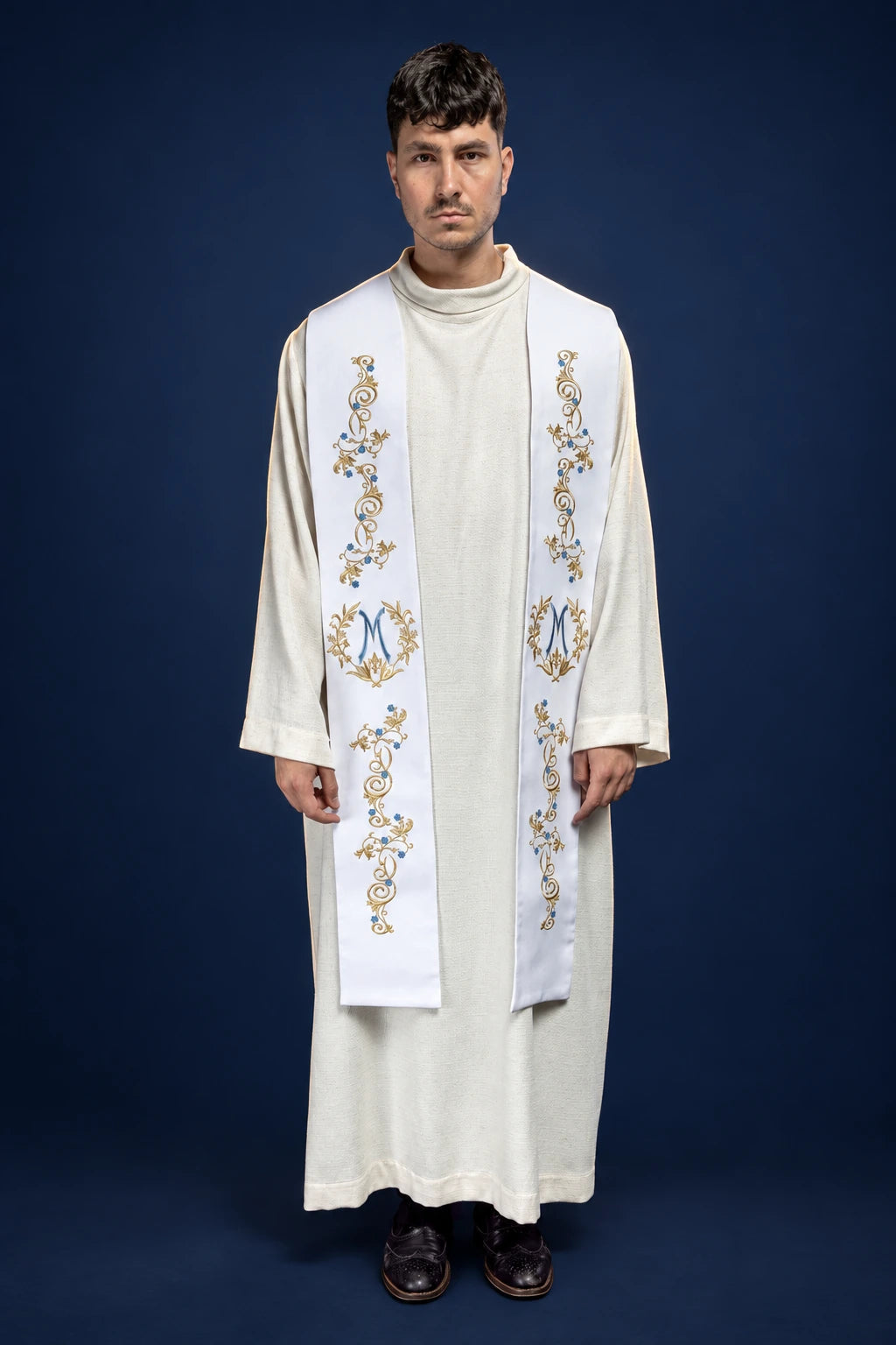 Front view of a white priest stole with gold Marian embroidery and laurel wreath motifs