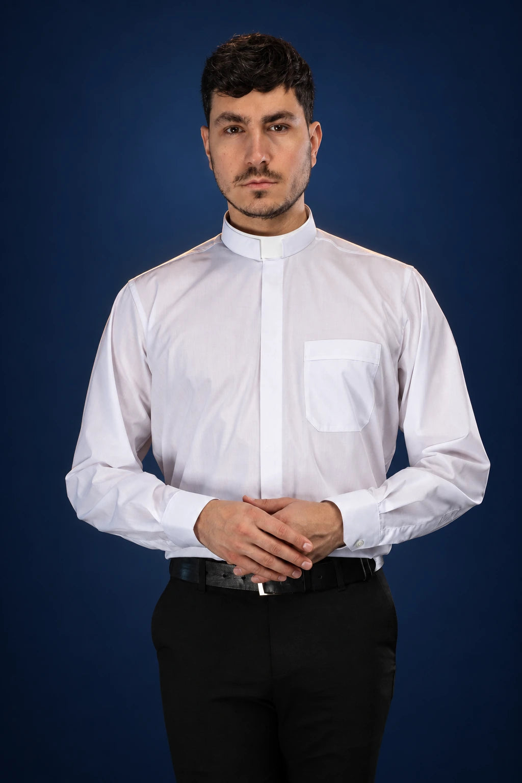 Front view of a white Roman clergy shirt with long sleeves, clerical collar, and chest pocket