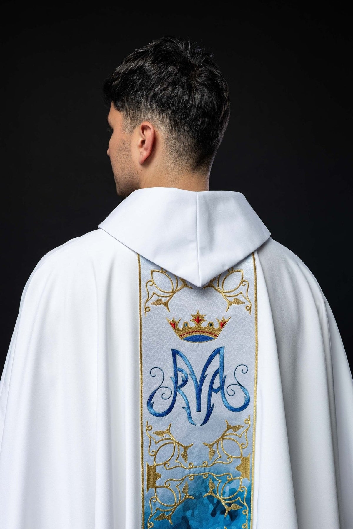 Marian chasuble, back view with blue sublimated orphrey, embroidered Marian symbol and gold trim