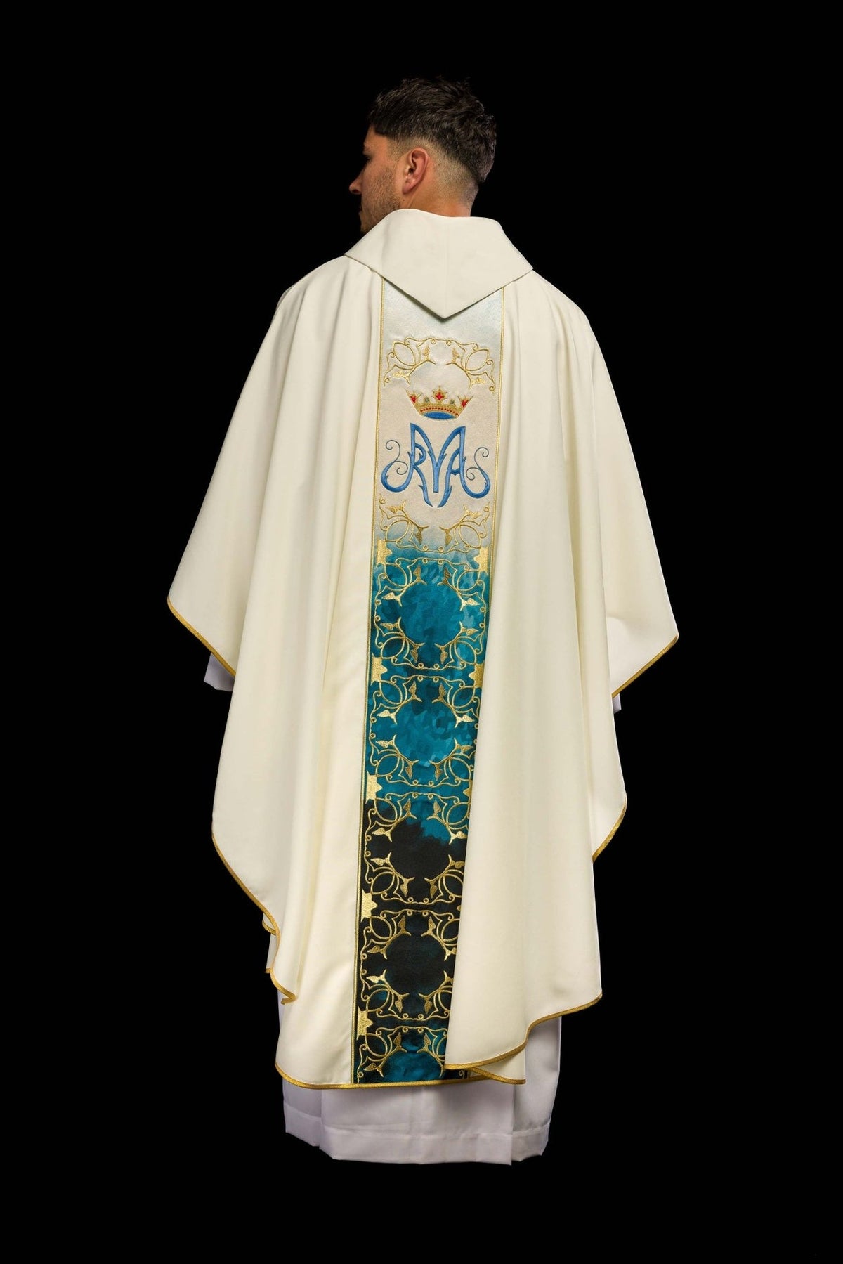 Full back view of ecru chasuble with blue-and-gold embroidered orphrey