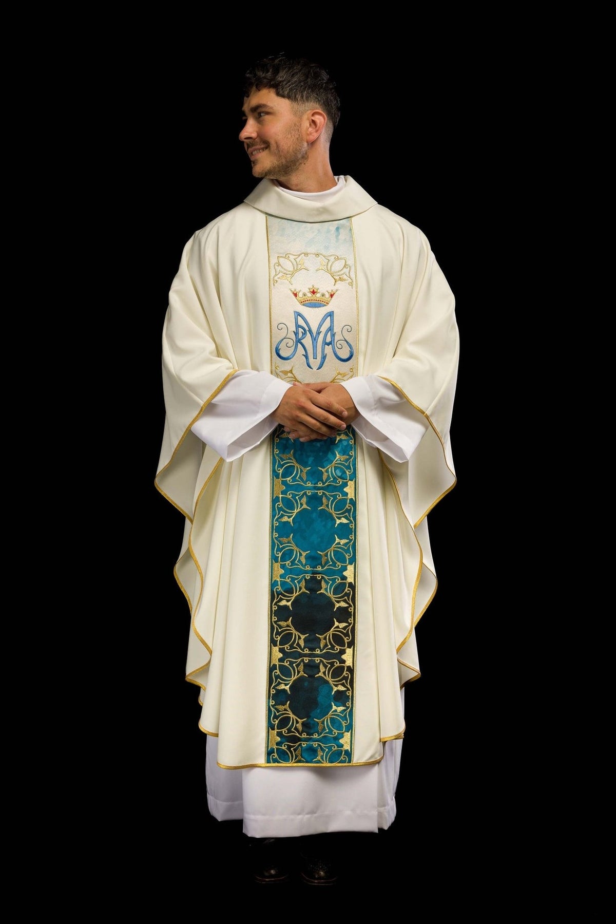 Full front view of ecru chasuble with gold trim and blue-and-gold Marian orphrey