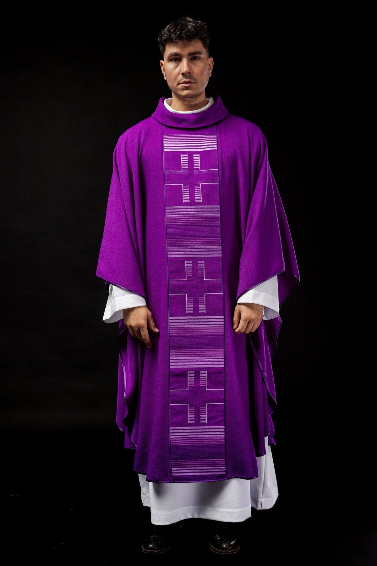 Purple chasuble front view with three silver embroidered crosses and horizontal trim