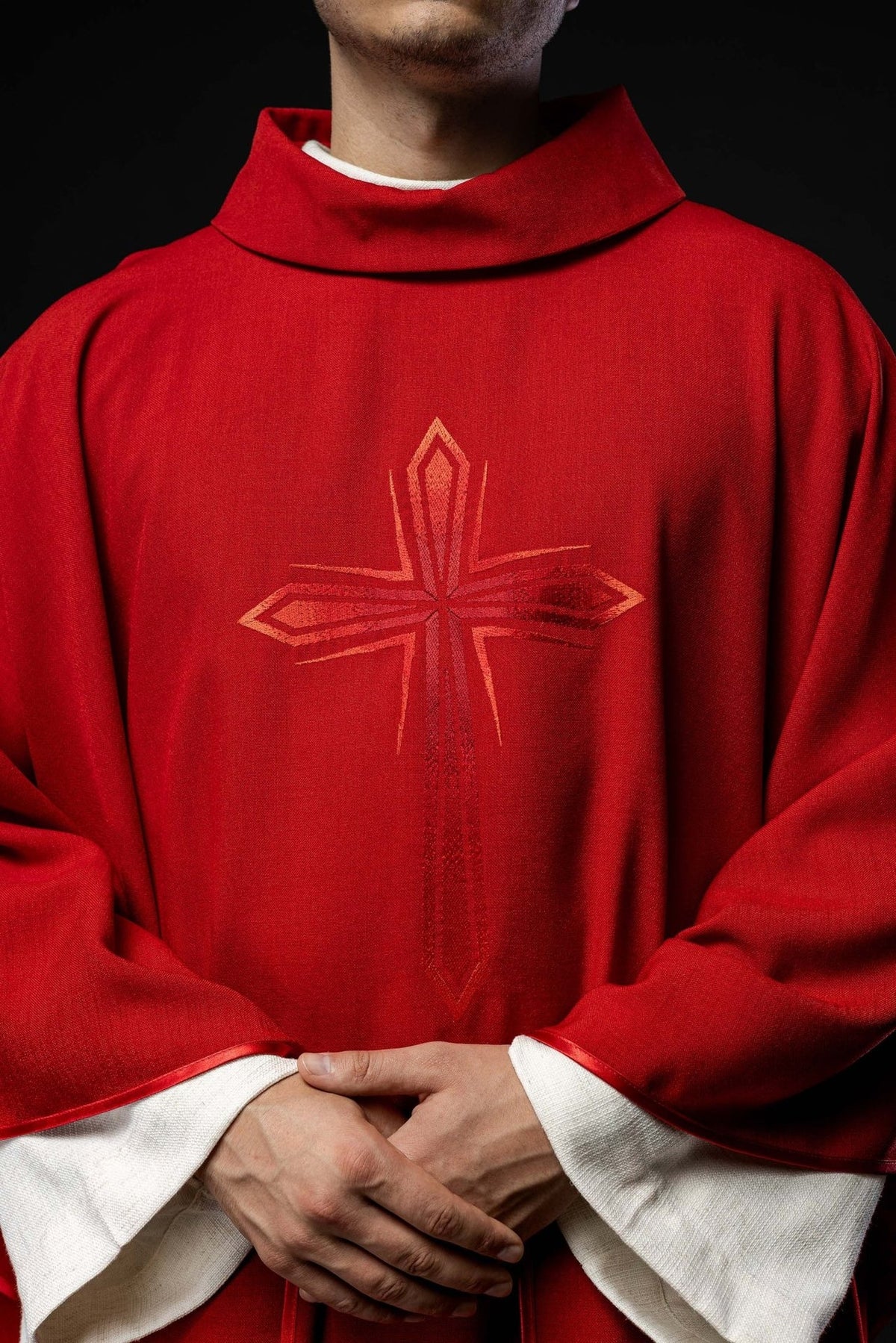 Red chasuble front close-up with stand-up collar and embroidered cross