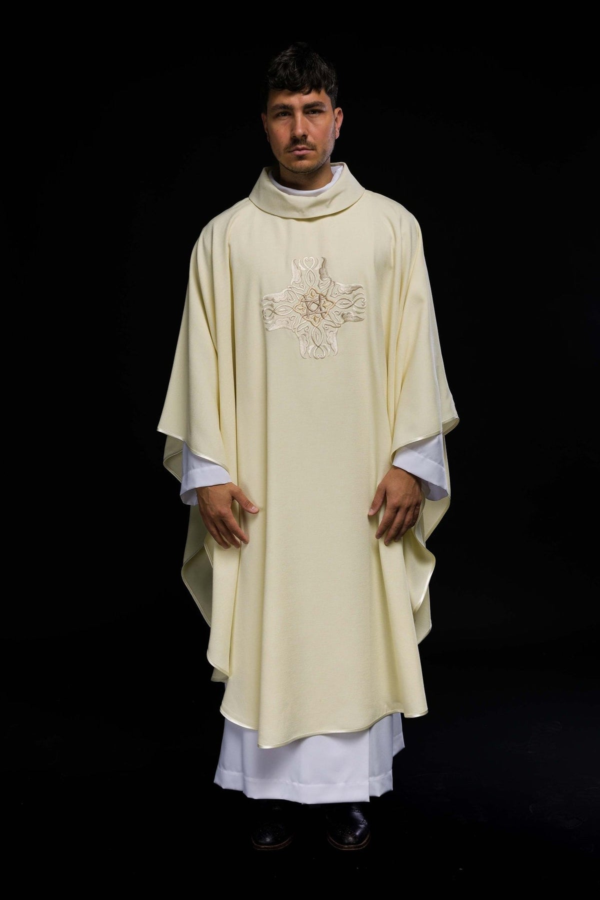 Ecru chasuble front view with embroidered cross and satin trim