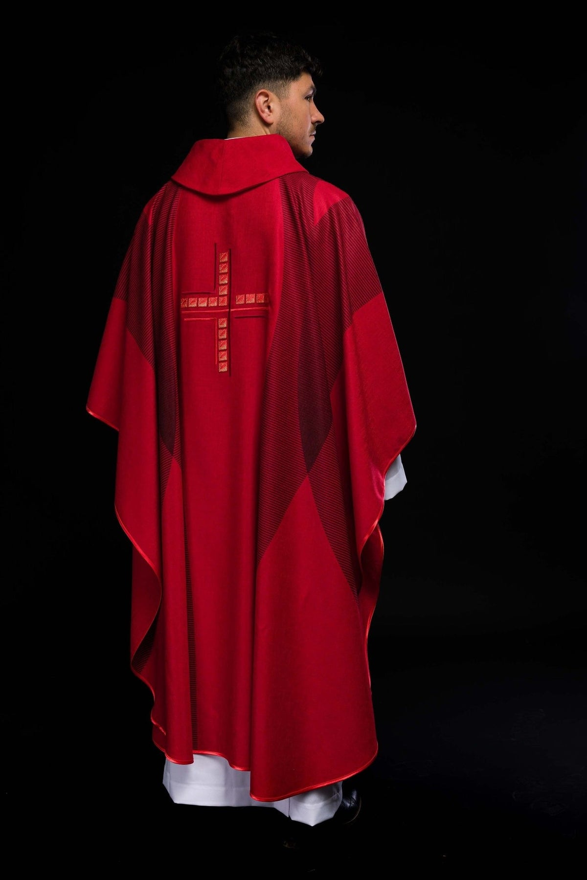 Red chasuble rear three-quarter view with embroidered cross