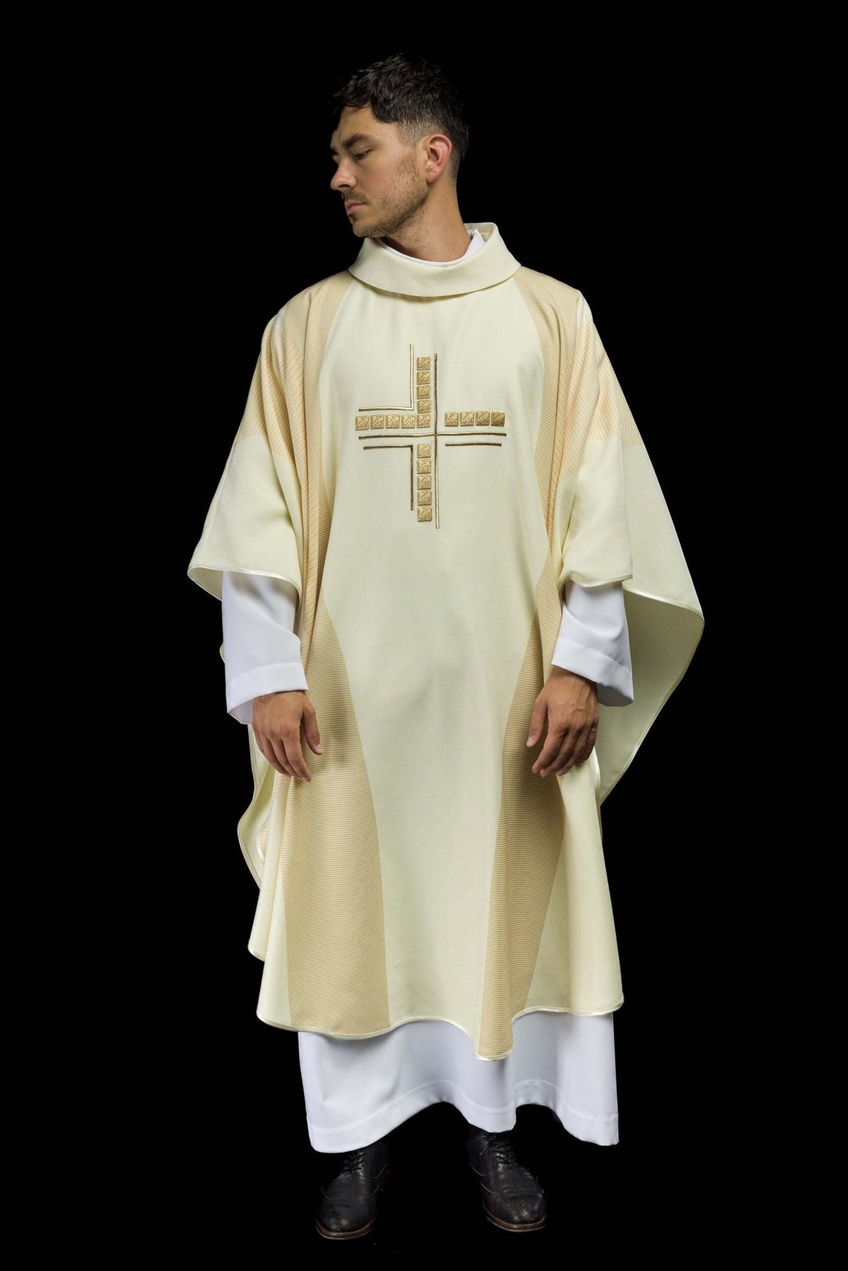Ecru chasuble front view with embroidered cross and striped trim