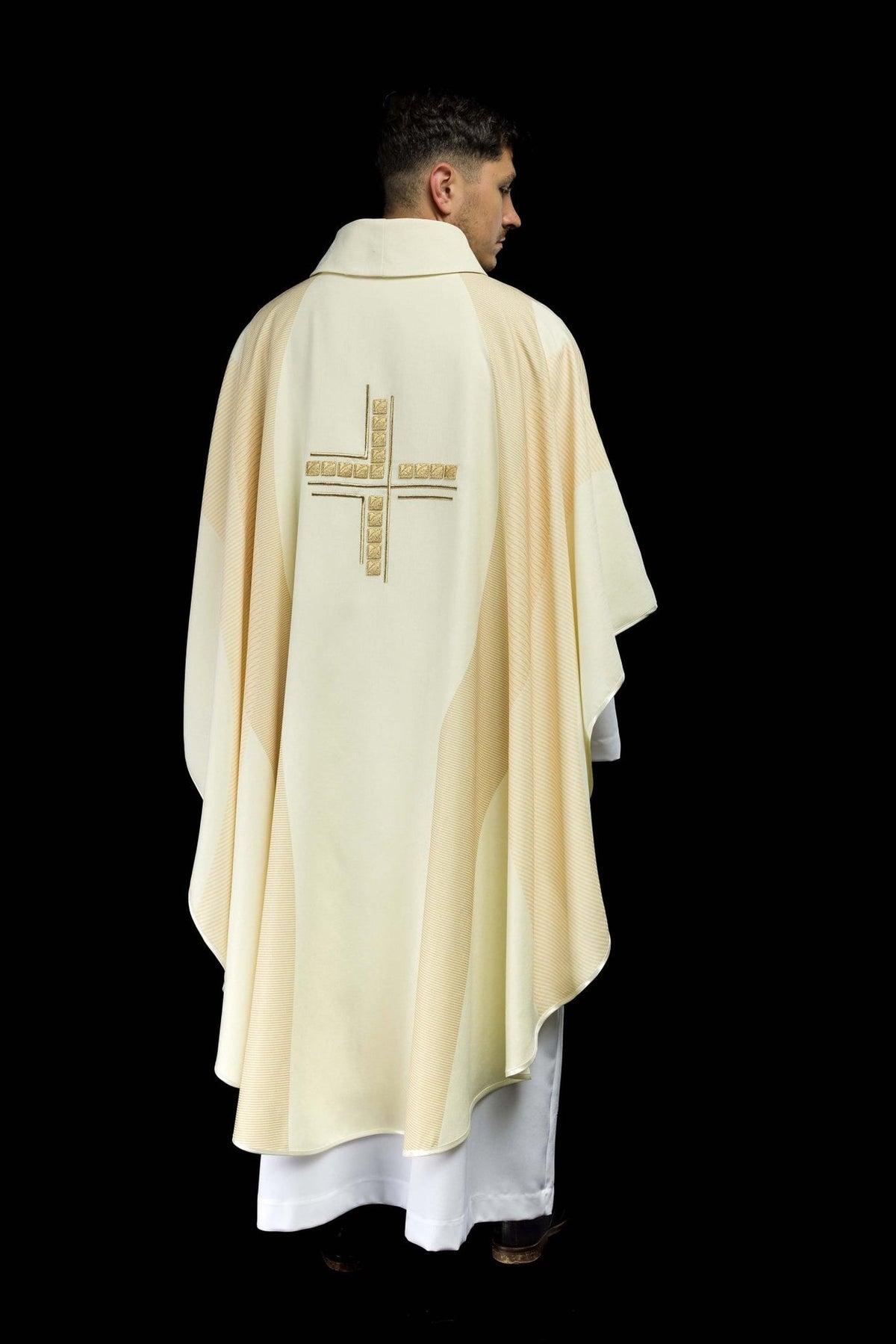 Ecru chasuble back view with embroidered cross and striped trim