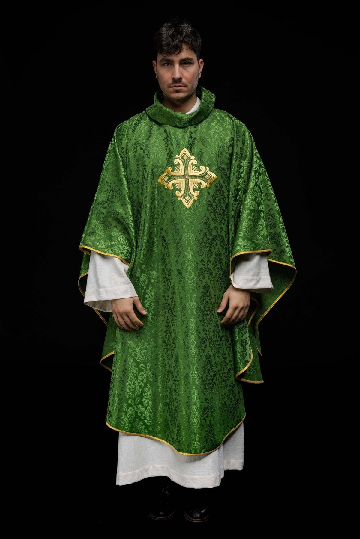 Green chasuble front view with gold embroidered cross and gold trim