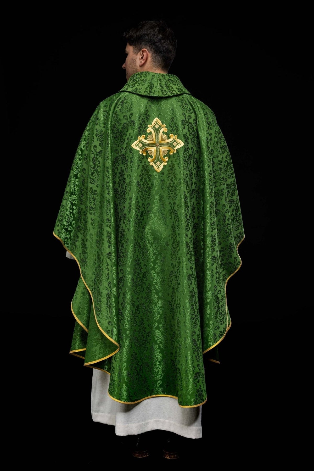 Green chasuble back view with gold embroidered cross and stand-up collar