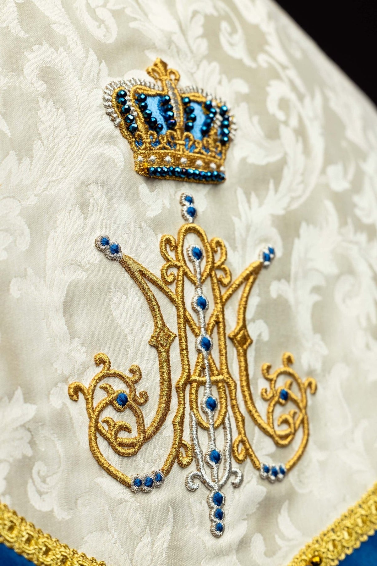 Marian cope embroidered Marian symbol and crown with blue natural stones