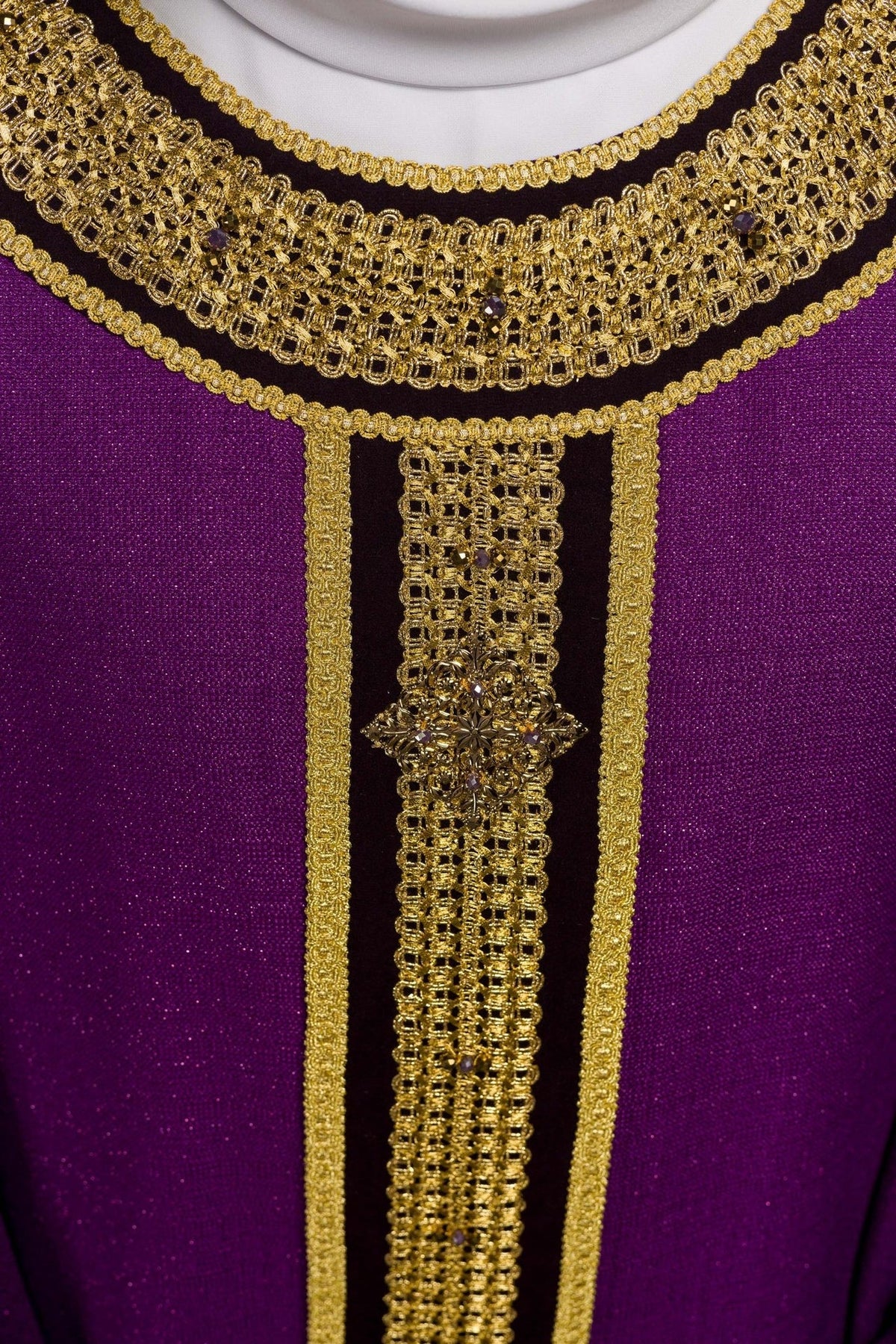 Purple chasuble gold orphrey detail with floral ornament and natural stones