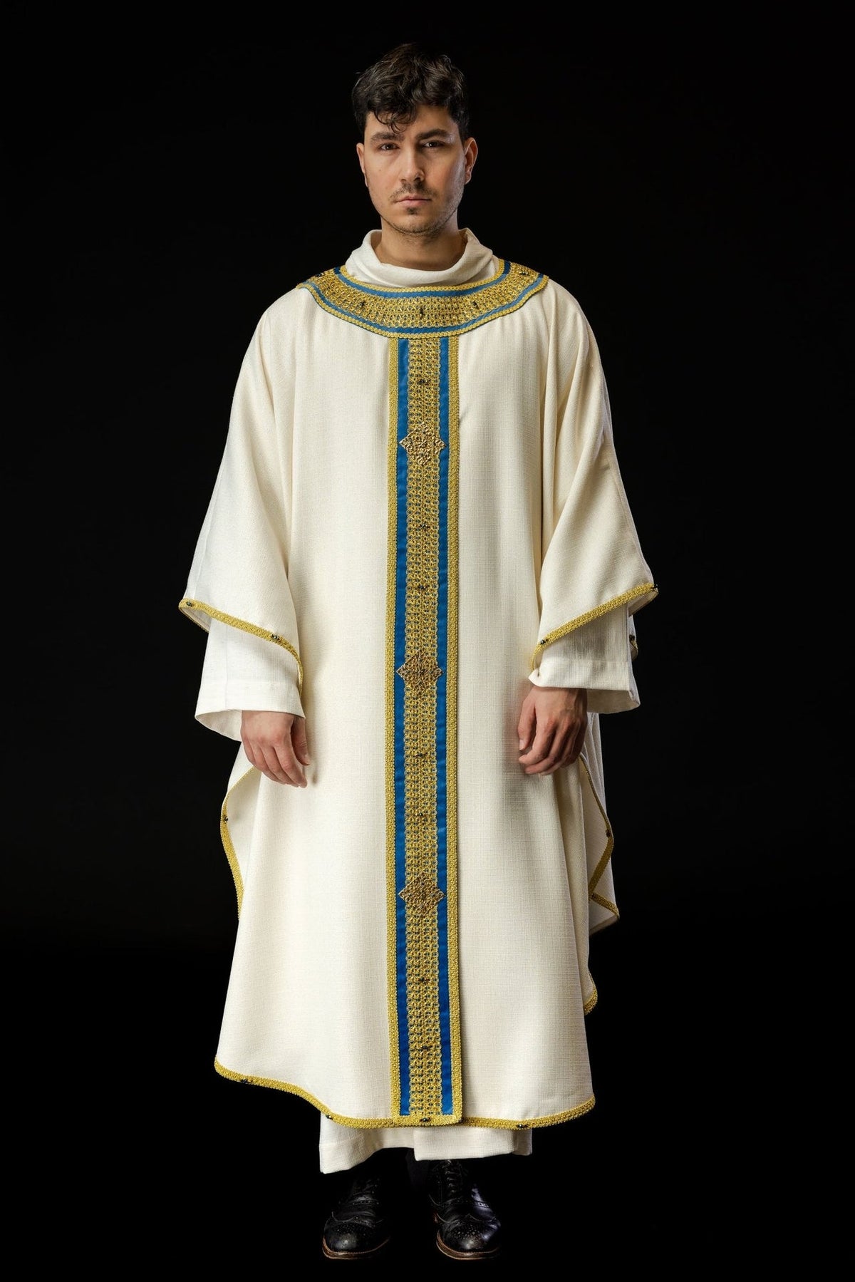 Handcrafted chasuble full front view in ivory with blue and gold orphrey and trim