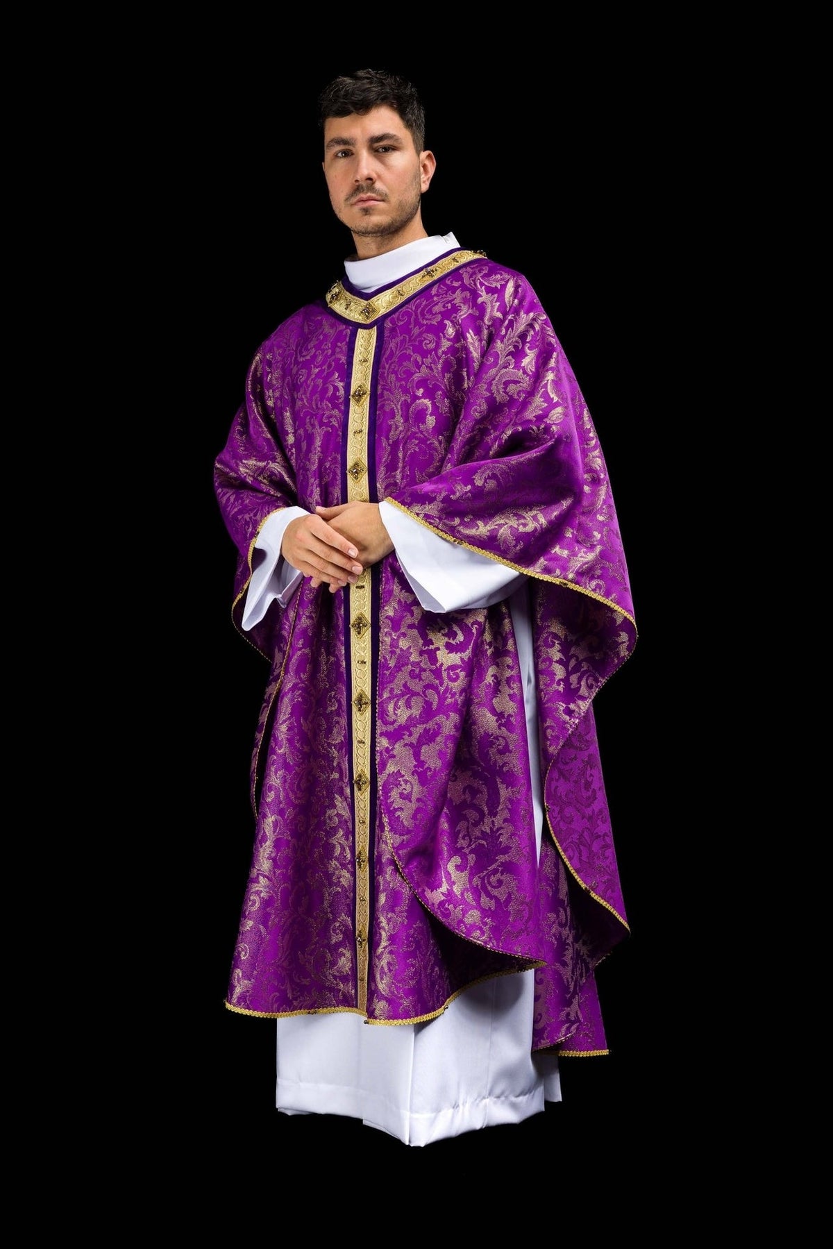 Handcrafted Catholic chasuble in purple with gold floral jacquard and central gold orphrey, front view