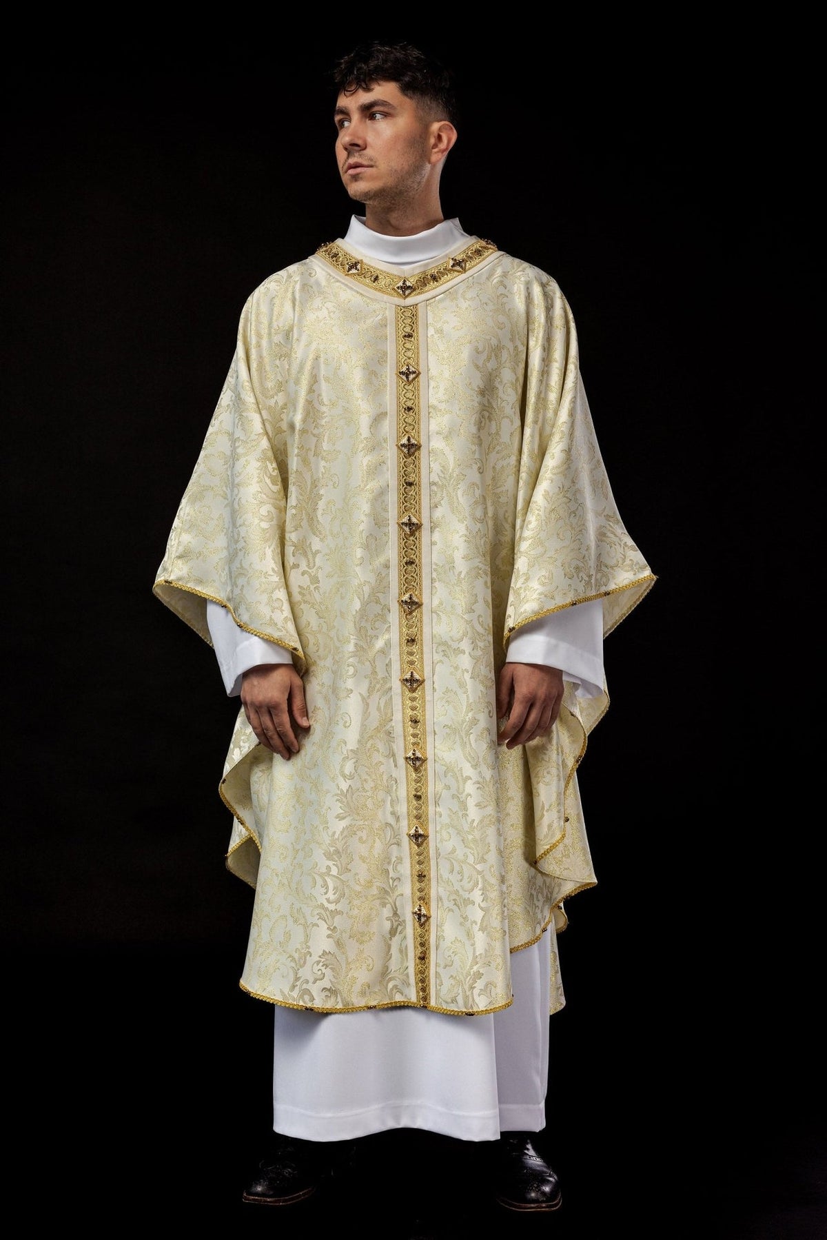 Ecru and gold chasuble, full front view with patterned fabric and jeweled orphrey