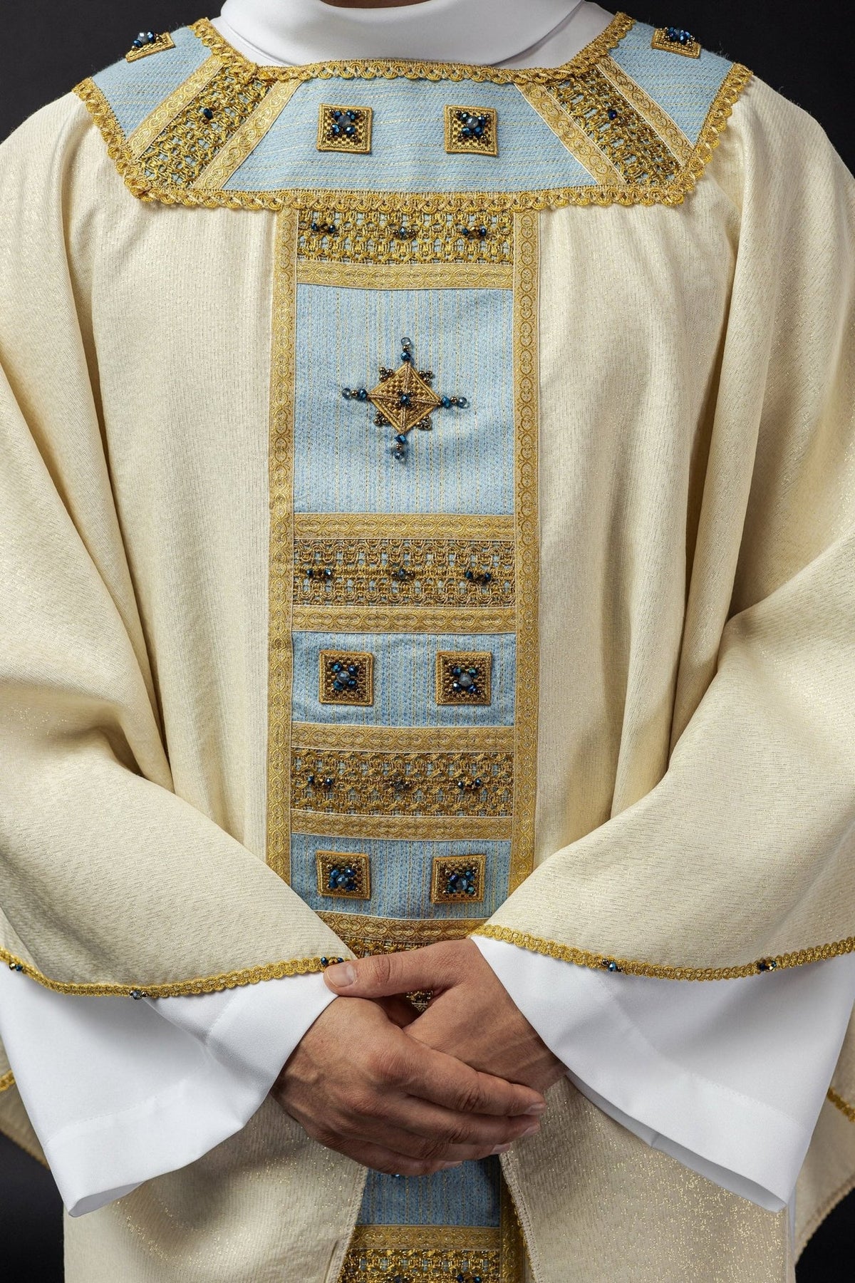 Marian chasuble, front close-up showing blue orphrey, gold embroidery and stone embellishments